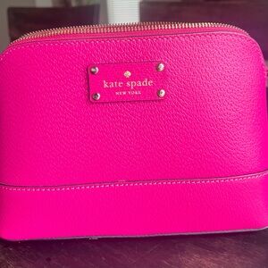 Hot Pink Kate Spade cross body bag.